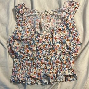 LA hearts floral tank top. Only work once. In great condition.
